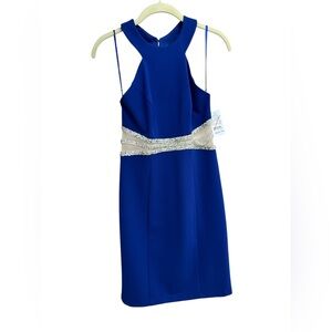 Blue sequin dress with flattering straps. Brand new!